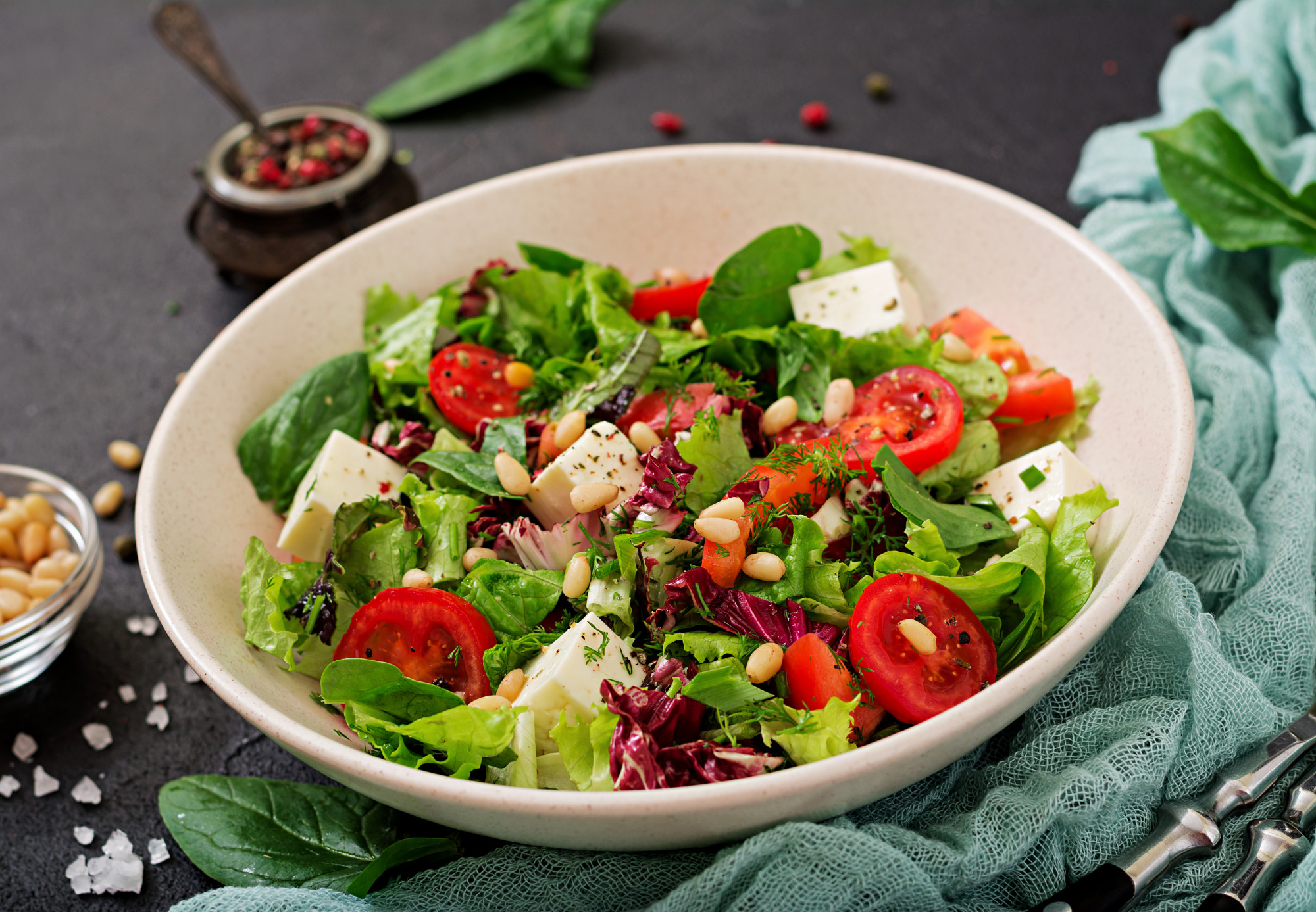 dietary-salad-with-tomatoes-feta-lettuce-spinach-pine-nuts